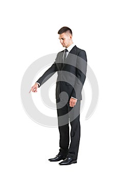 Young and confident businessman on white