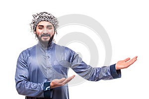 Young confident egypt man presenting product wearing white thobe isolated on a white background photo