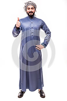 Young confident egypt man with thumbs up wearing white thobe isolated on a white background photo