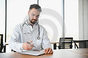 Young and confident male doctor portrait. Successful doctor career concept