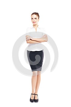 Young, confident, successful and beautiful business woman isolated on white.