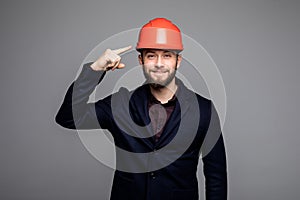 Young construction worker pointed on hard hat