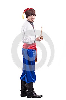 Young cossack in national ukrainian dress isolated on white background