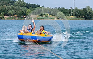 Young couiple on water attractions during summer vacations