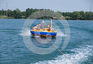 Young couiple on water attractions during summer vacations