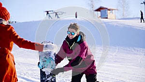 Young coulple dating in mountain ski resort at sunny day. Winter, sport, holidays, relationship, love, xmas, lifestyle