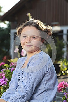 Young countrygirl with plaited hair