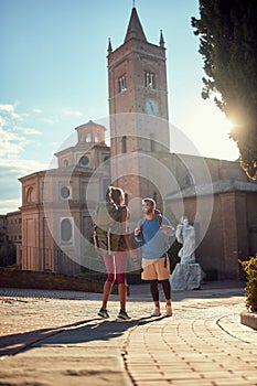 Young couple at active sightseeing in italy, toscana