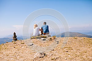 Young couple are admiring the landscape