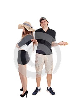 Young couple arguing, standing helpless