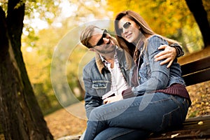 Young couple in the autumn park