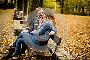 Young couple in the autumn park