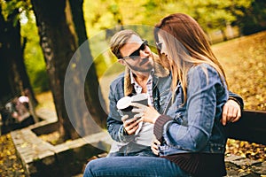 Young couple in the autumn park