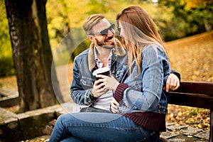 Young couple in the autumn park