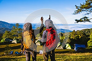 Young couple Backpacker Camping Hiking Journey Travel Trek Concept, Holiday travel, summer in Thailand