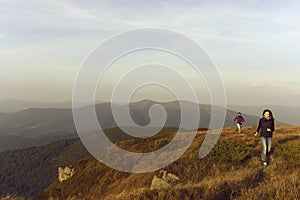 Young couple hike on mountain