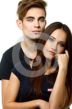 Young couple, beautiful cheerful woman and man over white