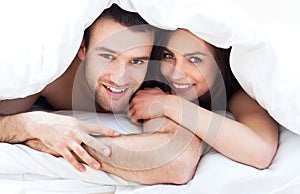 Young couple in bed