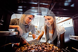 Young Couple With Burnt Pizza