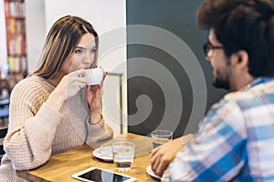 Couple in cafe enjoying the time spending with each other