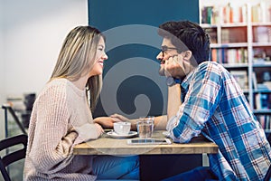 Couple in cafe enjoying the time spending with each other