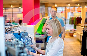 Young couple in the clothes shop