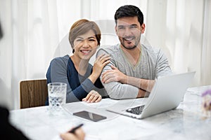 Young couple consulting with professional consultant