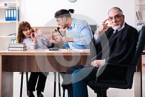 Young couple in the courthouse in divorce concept