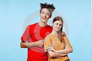 young couple cropped view studio blue background communication
