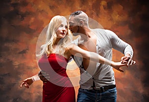 Young couple dances Caribbean Salsa