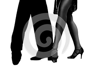 Young couple dancing on background, closeup of legs