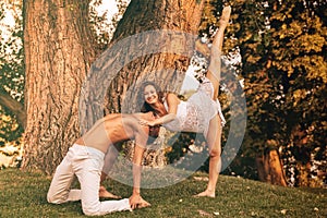 Young couple dancing in the park