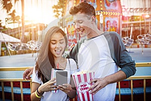 Young Couple Date Amusement Park Concept