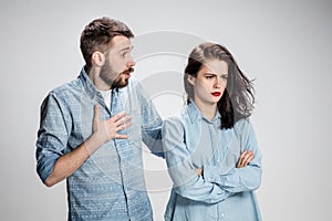 The young couple with different emotions during conflict