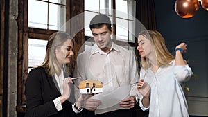 Young couple discussing future design with architect.