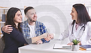 Young couple at doctor`s office during visit