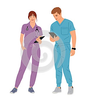Young couple of doctors, nurses in medic scrubs.