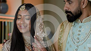 Young Couple Dressed In Arabic Style. Man In Blue Suit And Headdress Approaches The Girl.