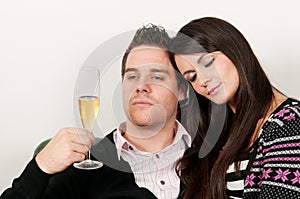 Young couple drinking champagne