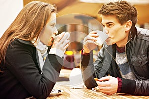 Young couple drinking coffee