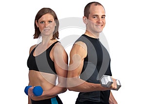 Young couple with dumbells photo