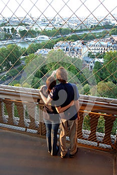 Young couple on Eiffel tower