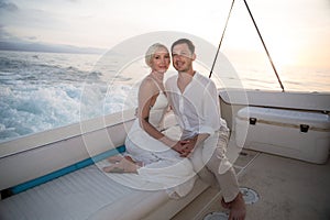 Young couple elope on boat