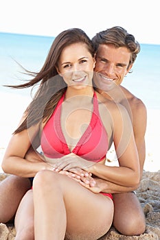 Young Couple Enjoying Beach Holiday