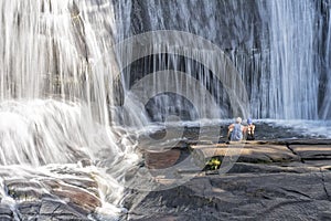 Young Couple Enjoying High Falls At The DuPont State Forest