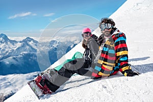 Young couple enjoying winter mountains