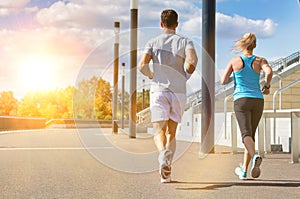 Young couple excersising in park