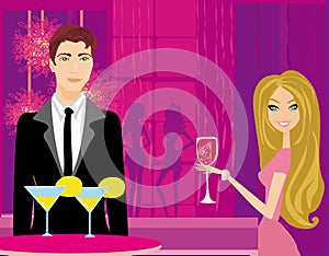 Young couple flirt and drink champagne in the club