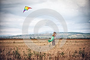 Young couple flying a kite