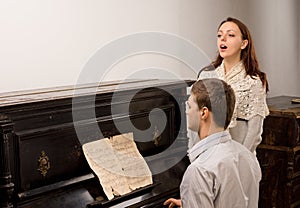 Young couple giving a singing recital photo